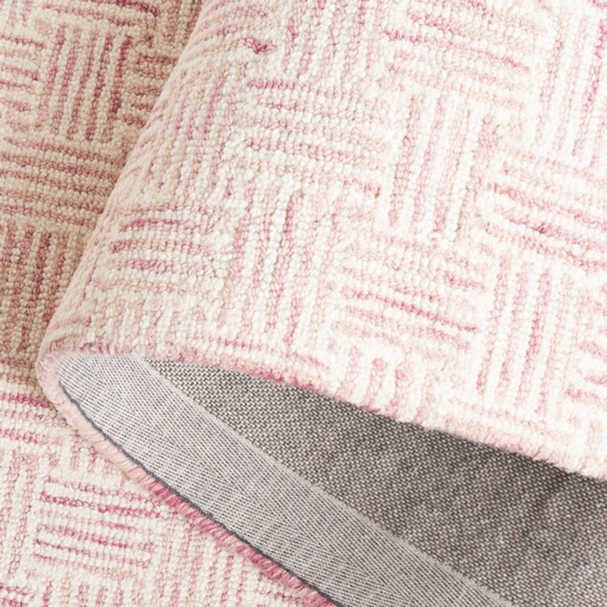Designteppich Rosa — Rückseite Detail